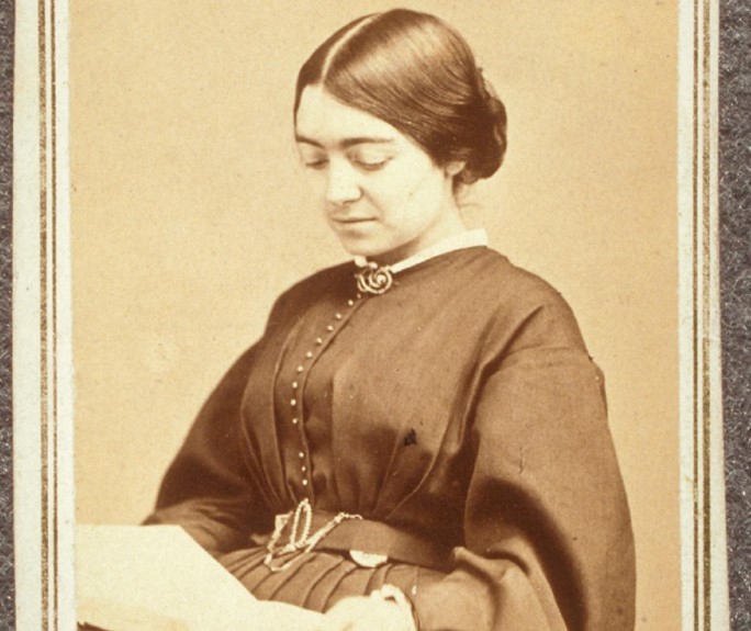 Mary Putnam Jacobi reading a book in a vintage photograph.